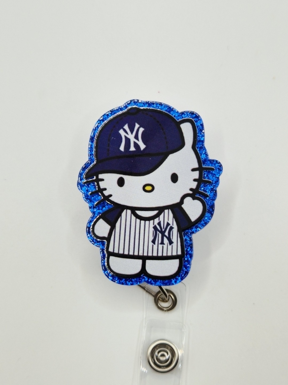 Hello Kitty x Yankees Blue Glitter Badge Reel- Belt Clip
